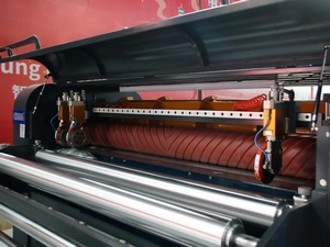 Slitting and edge trim collection system (pneumatic slitter knives)